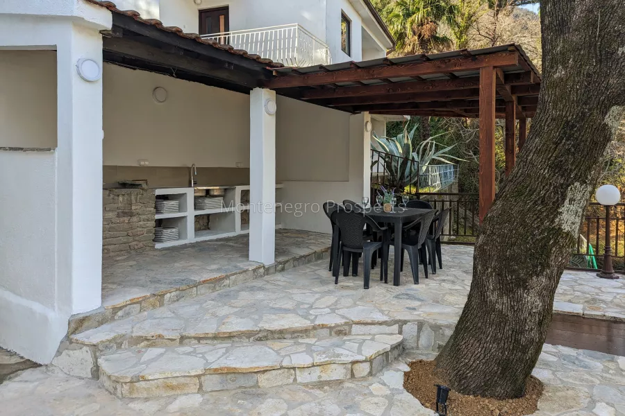 Outside kitchen with table